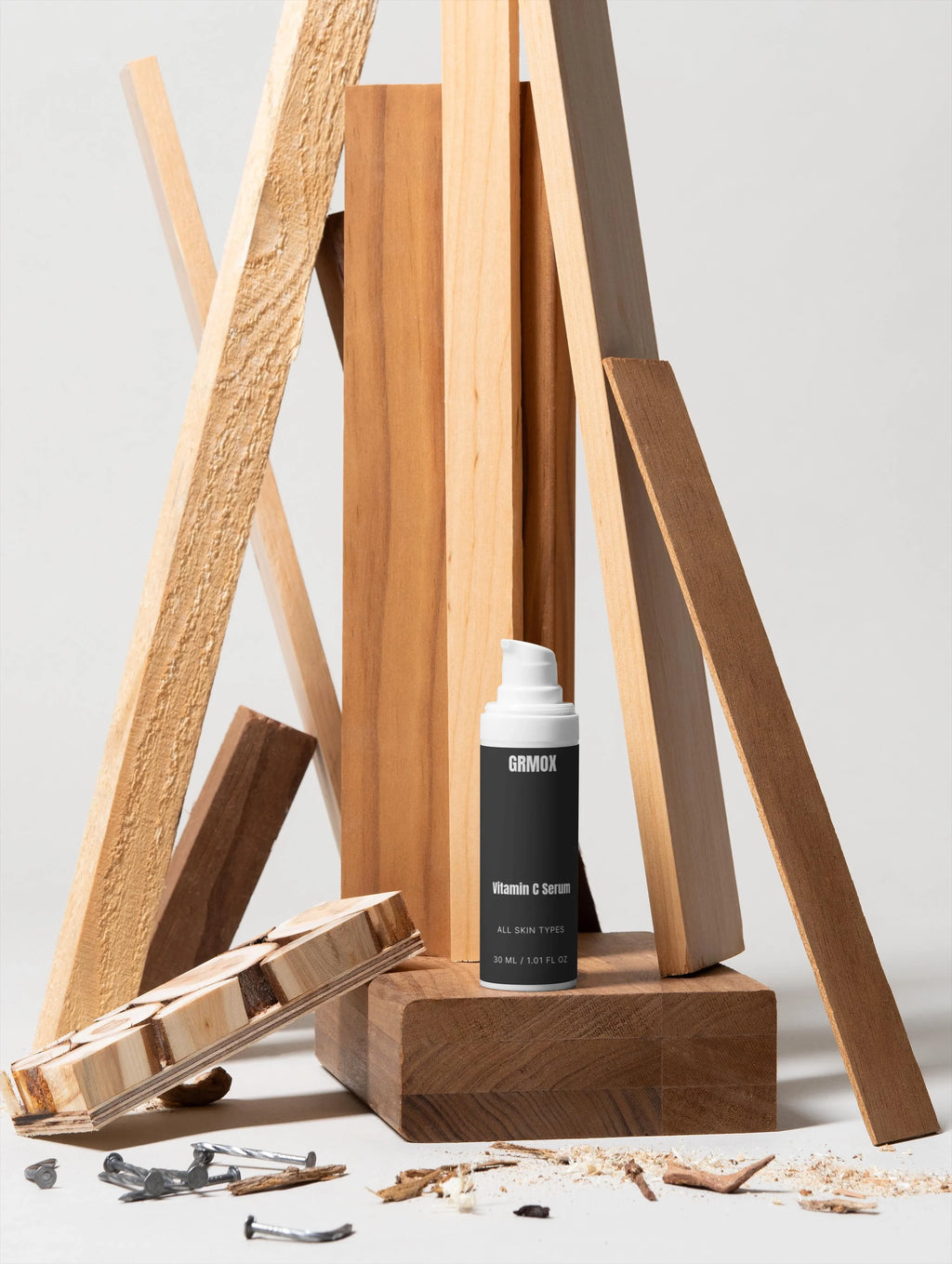 GRMOX Vitamin C Serum for all skin types, 30ml, displayed with rustic wooden planks and nails