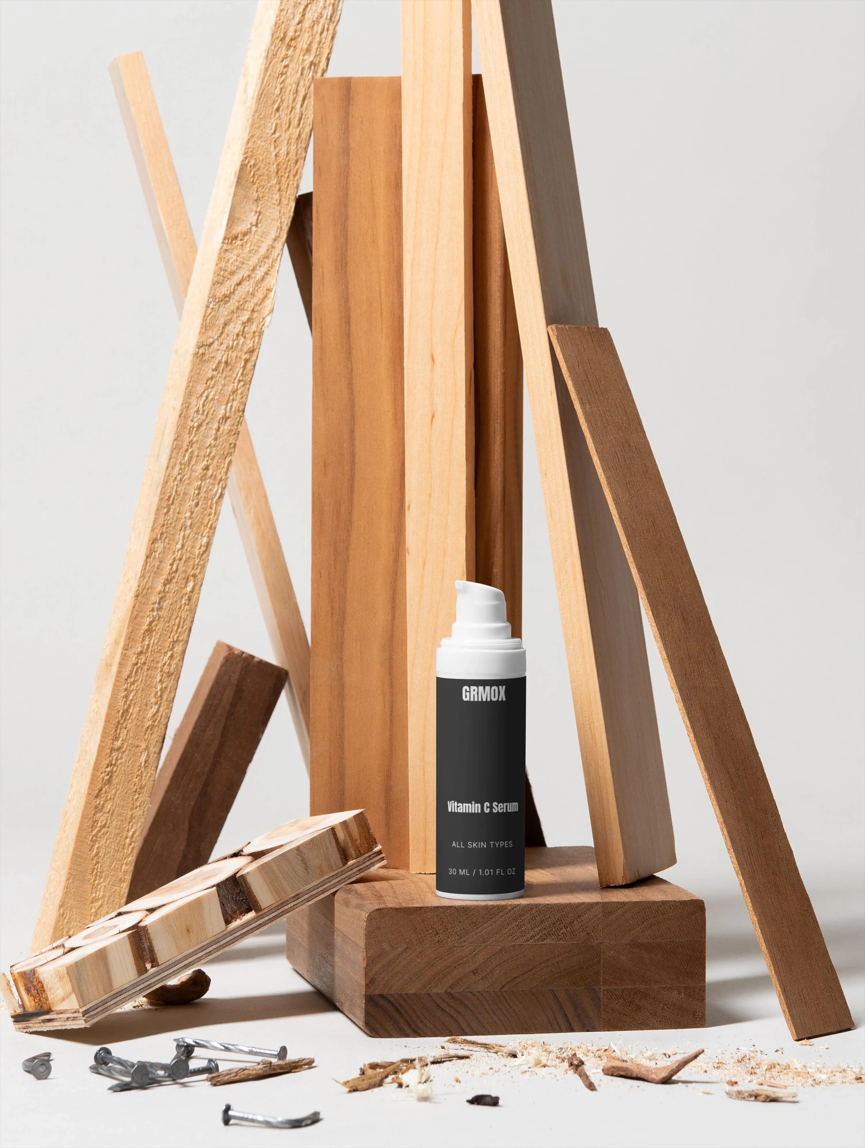 GRMOX Vitamin C Serum for all skin types, 30ml, displayed with rustic wooden planks and nails