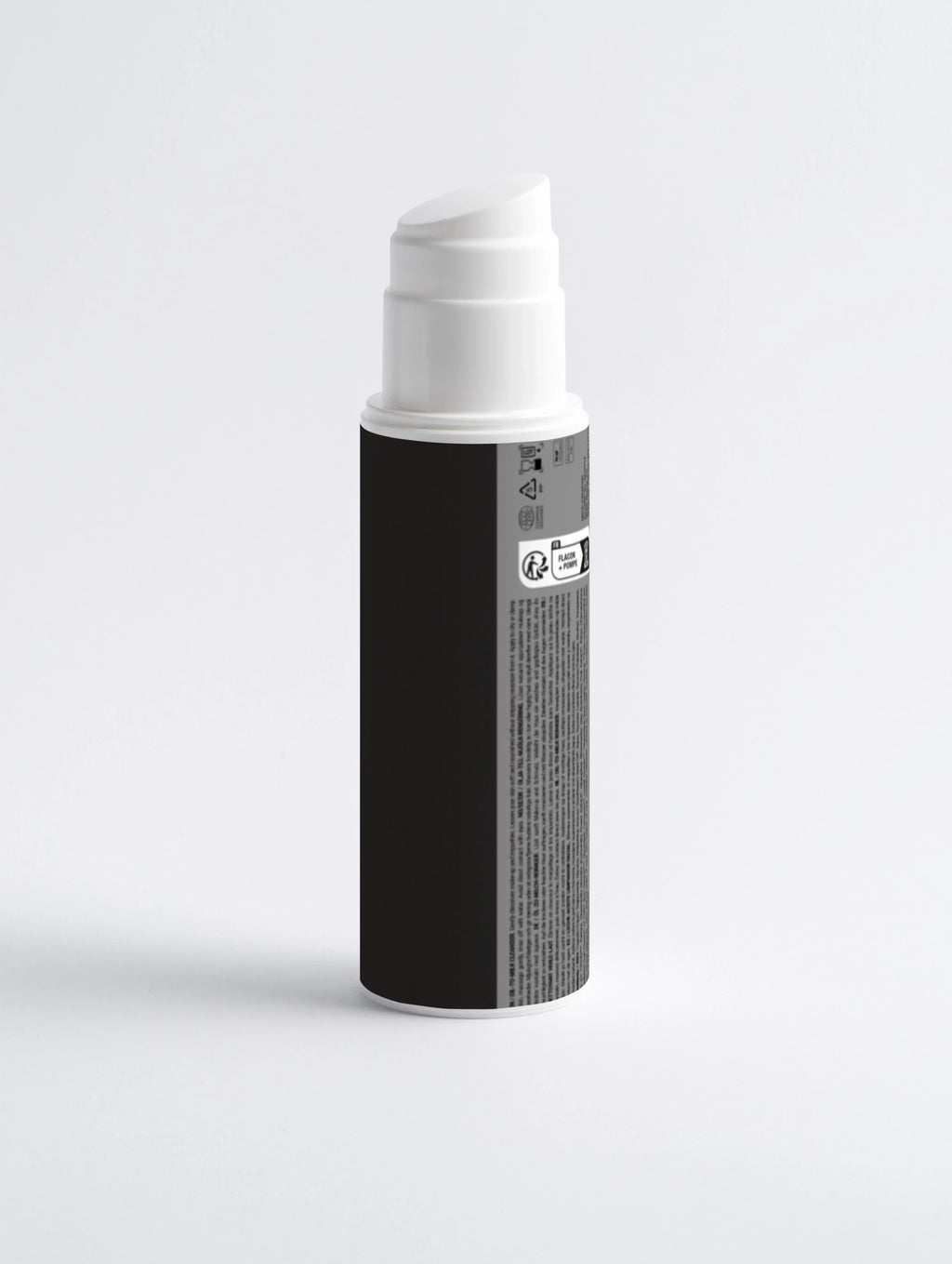 Black and white pump bottle with label, clean skincare product on white background