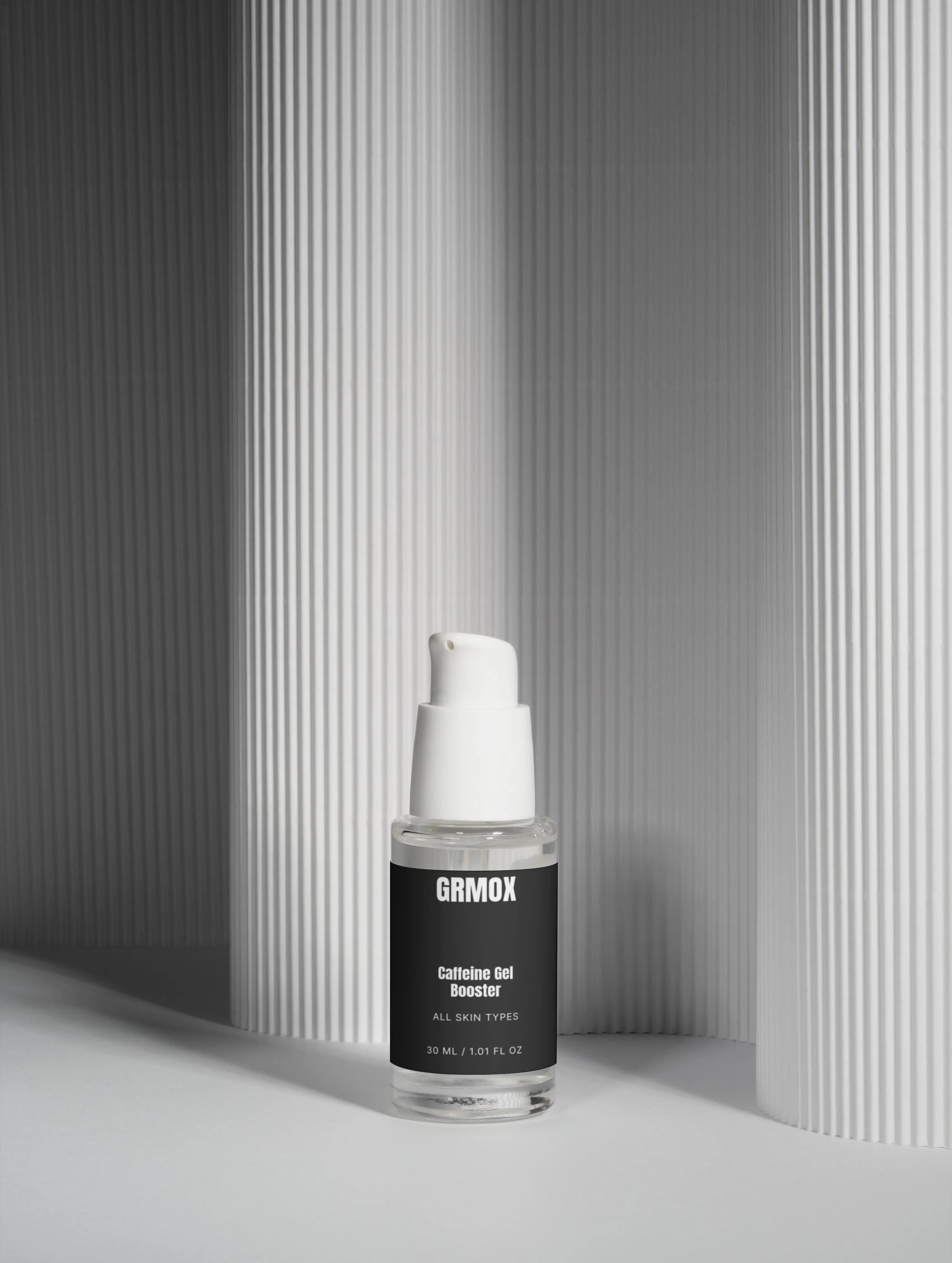 GRMOX Caffeine Gel Booster for all skin types, 30ml face serum in sleek glass bottle with white pump
