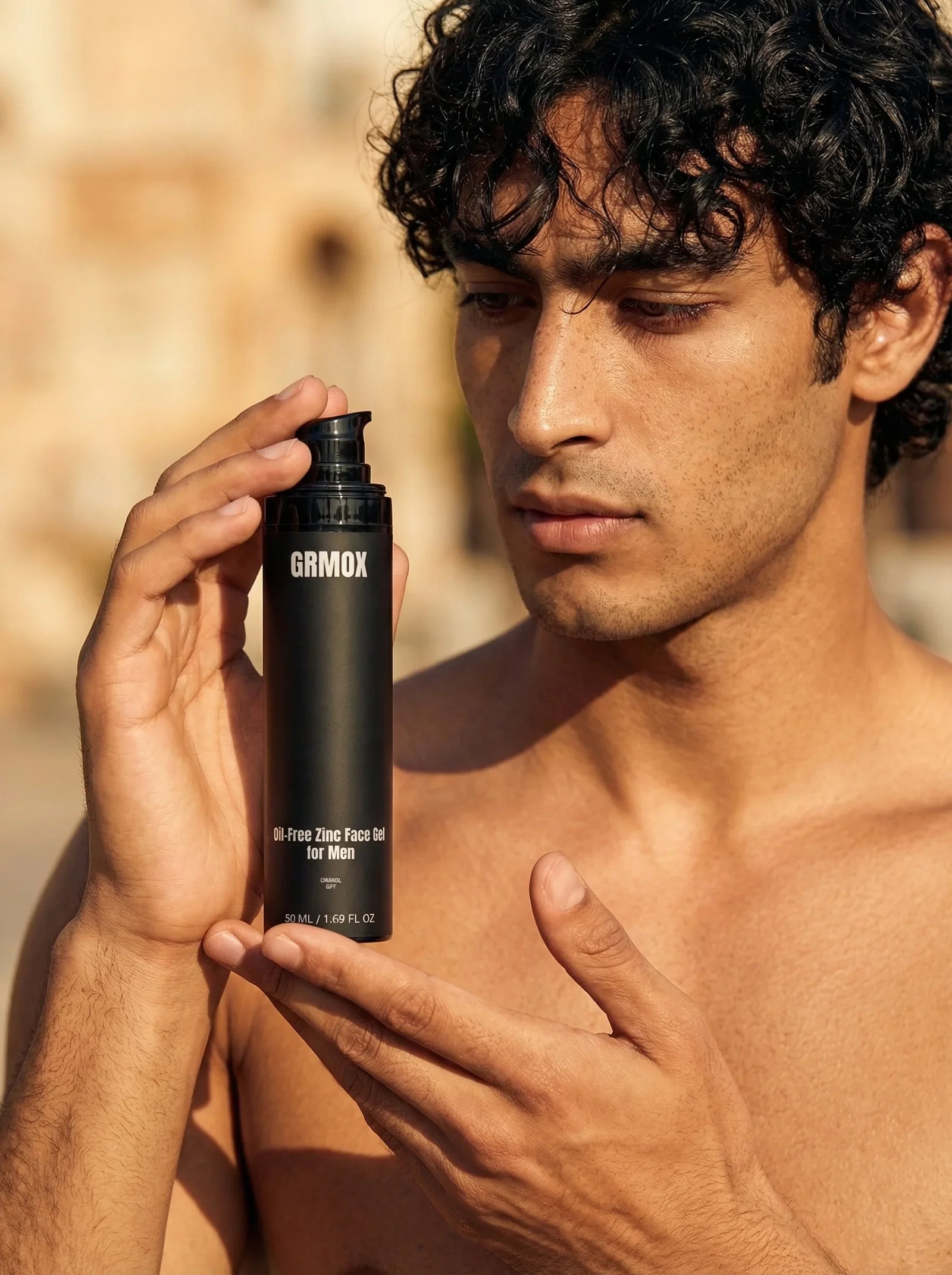 Man holding GRMOX Oil-Free Zinc Face Gel for Men, 50ml, ideal for daily skincare routine
