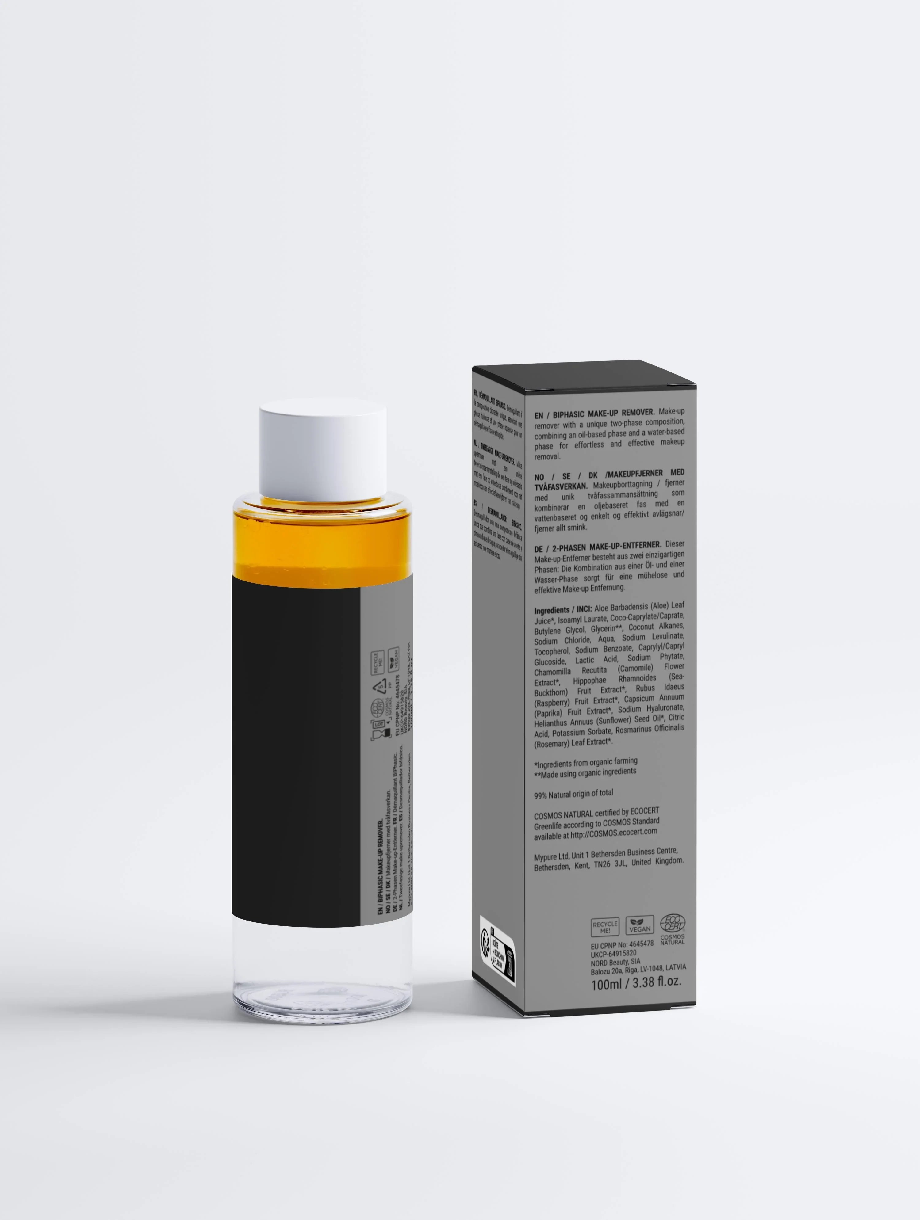 Biphasic makeup remover bottle with orange liquid and packaging, vegan and COSMOS Natural certified
