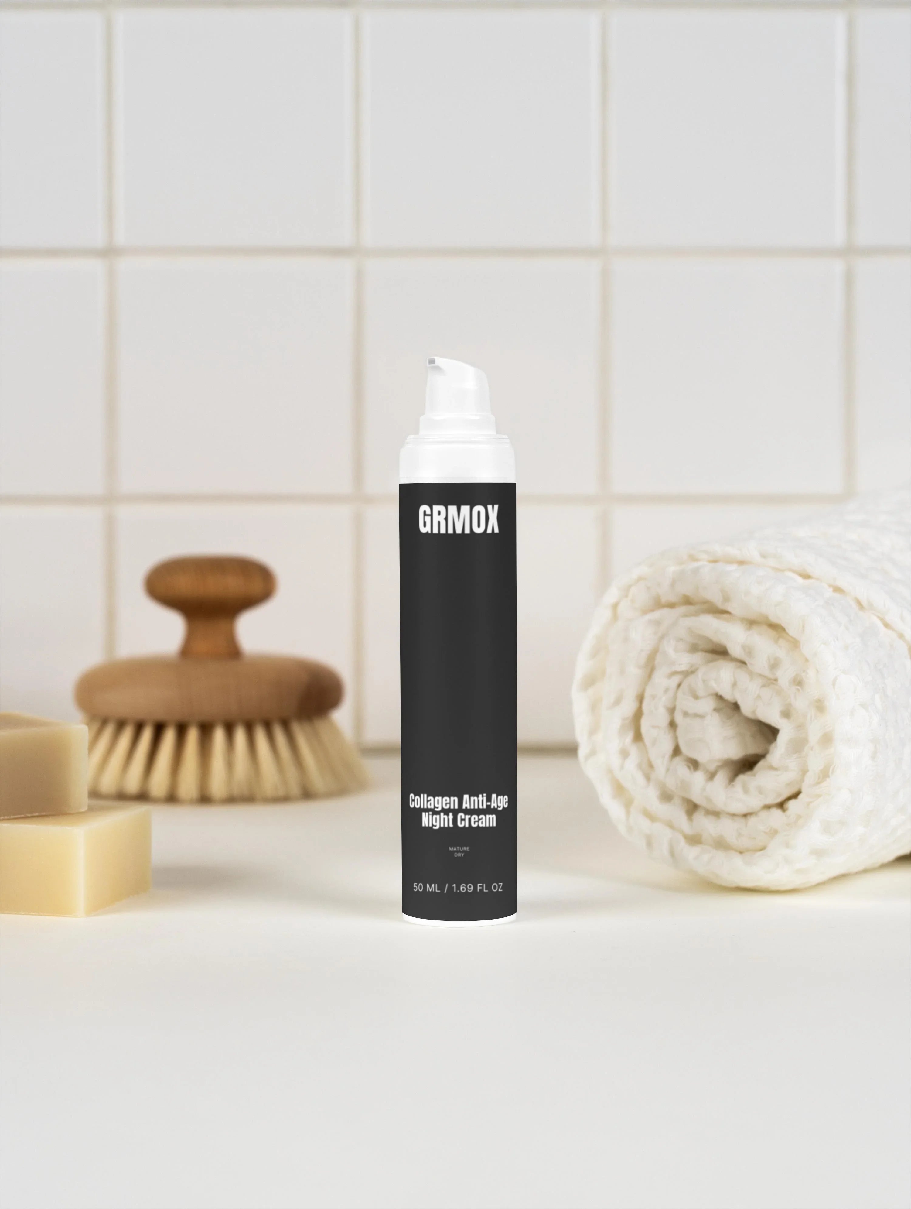 GRMOX Collagen Anti-Age Night Cream 50ml with towel and brush on tiled bathroom counter