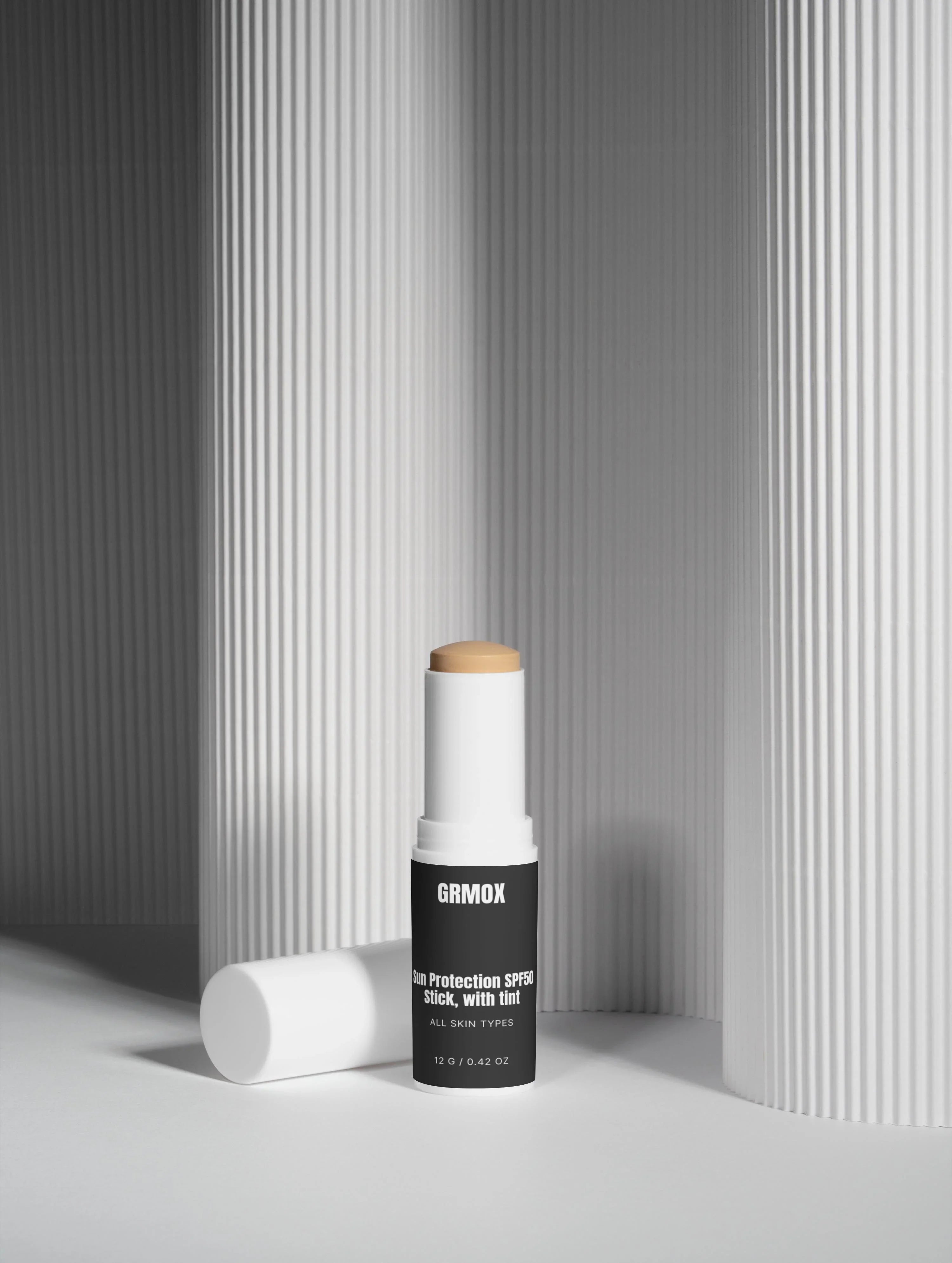 GRMOX Sun Protection SPF50 Stick with tint for all skin types, minimalist white packaging