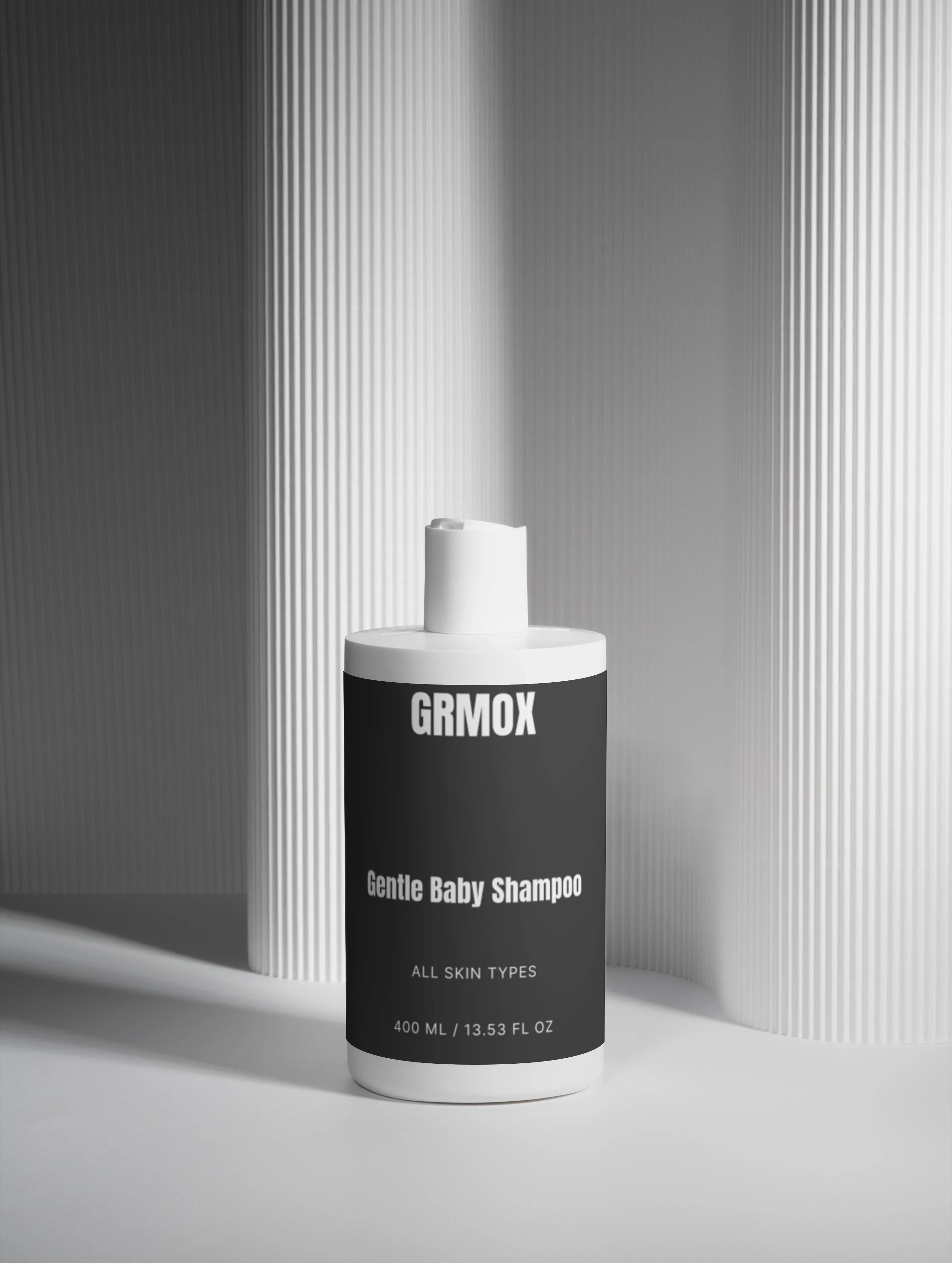 Gentle Baby Shampoo for All Skin Types, 400ml bottle with minimalist black label and white pump, modern studio lighting