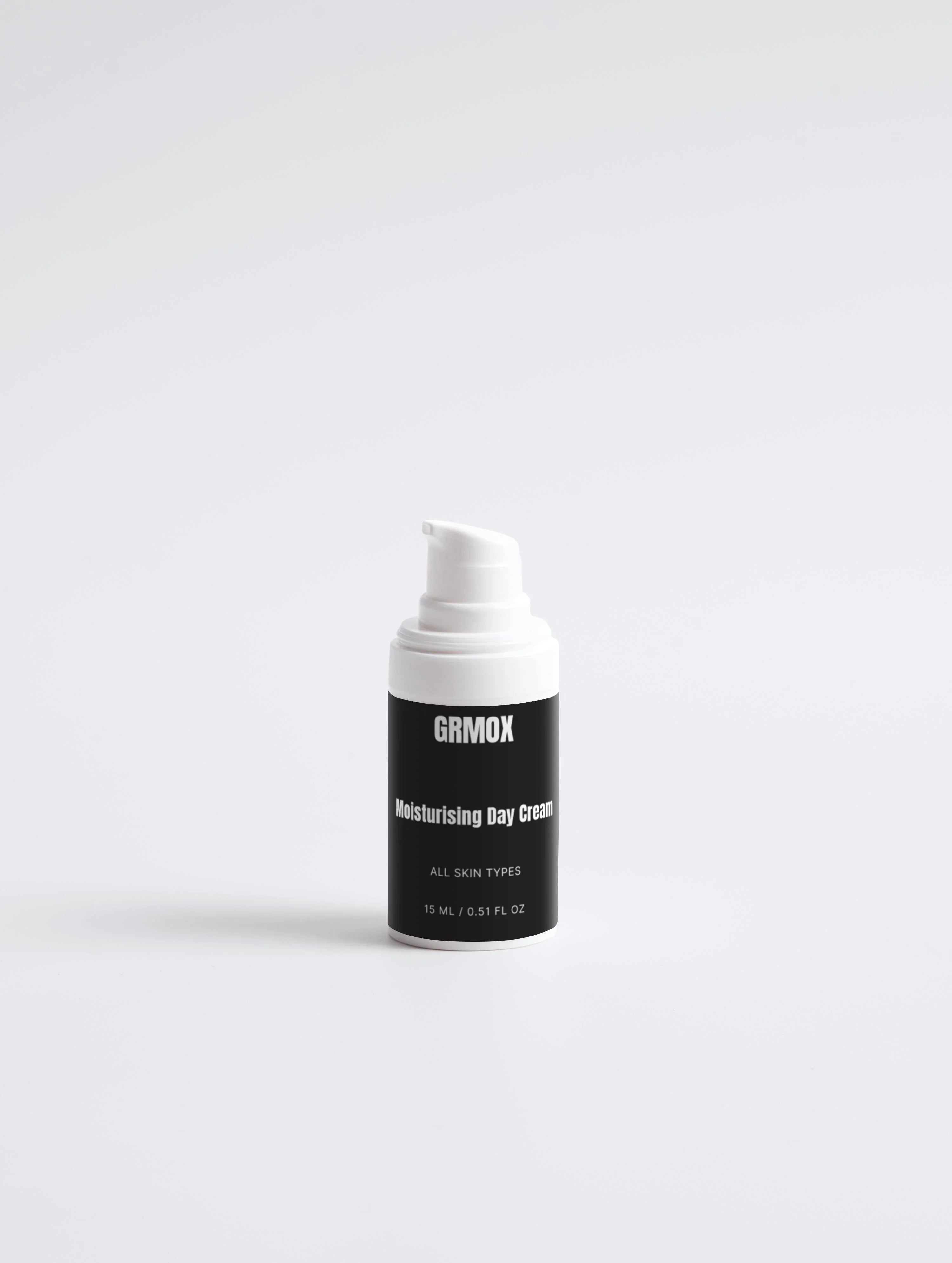 GRMOX Moisturising Day Cream for all skin types, 15ml pump bottle on white background