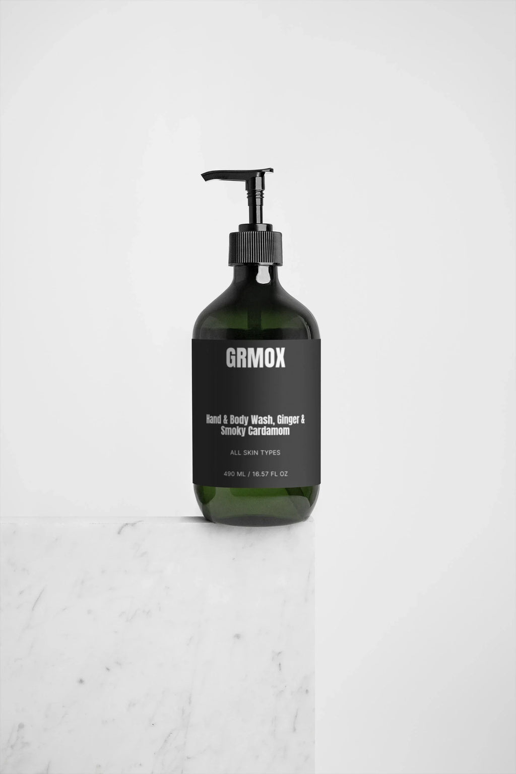 GRMOX Hand & Body Wash, Ginger & Smoky Cardamom, 490ml, for all skin types, in green glass bottle on marble