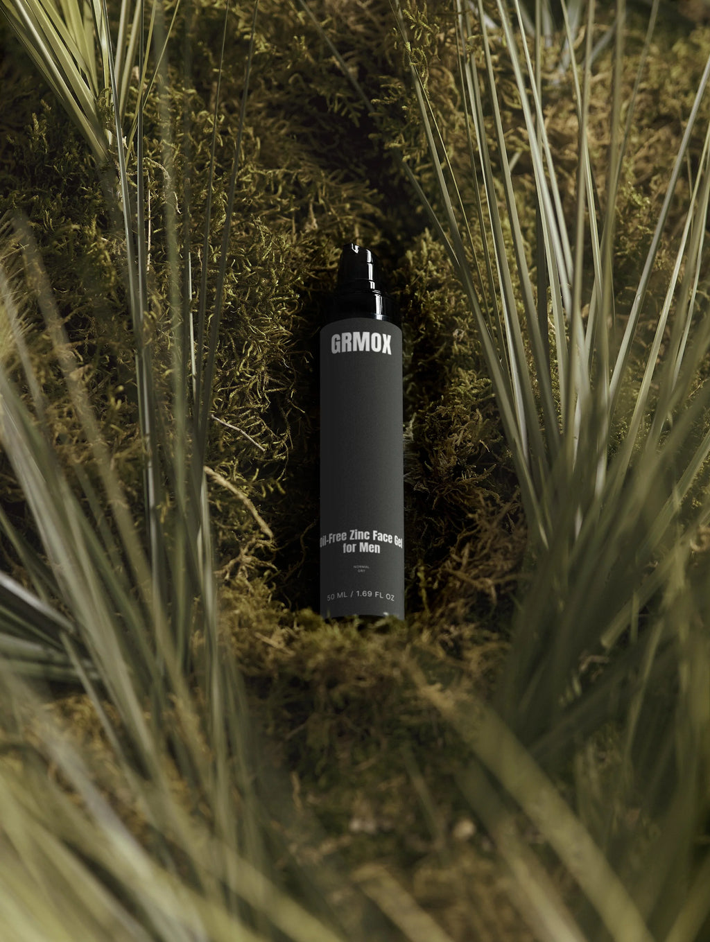 GRMOX Oil-Free Zinc Face Gel for Men nestled in moss and grass, 50ml skincare for normal to dry skin