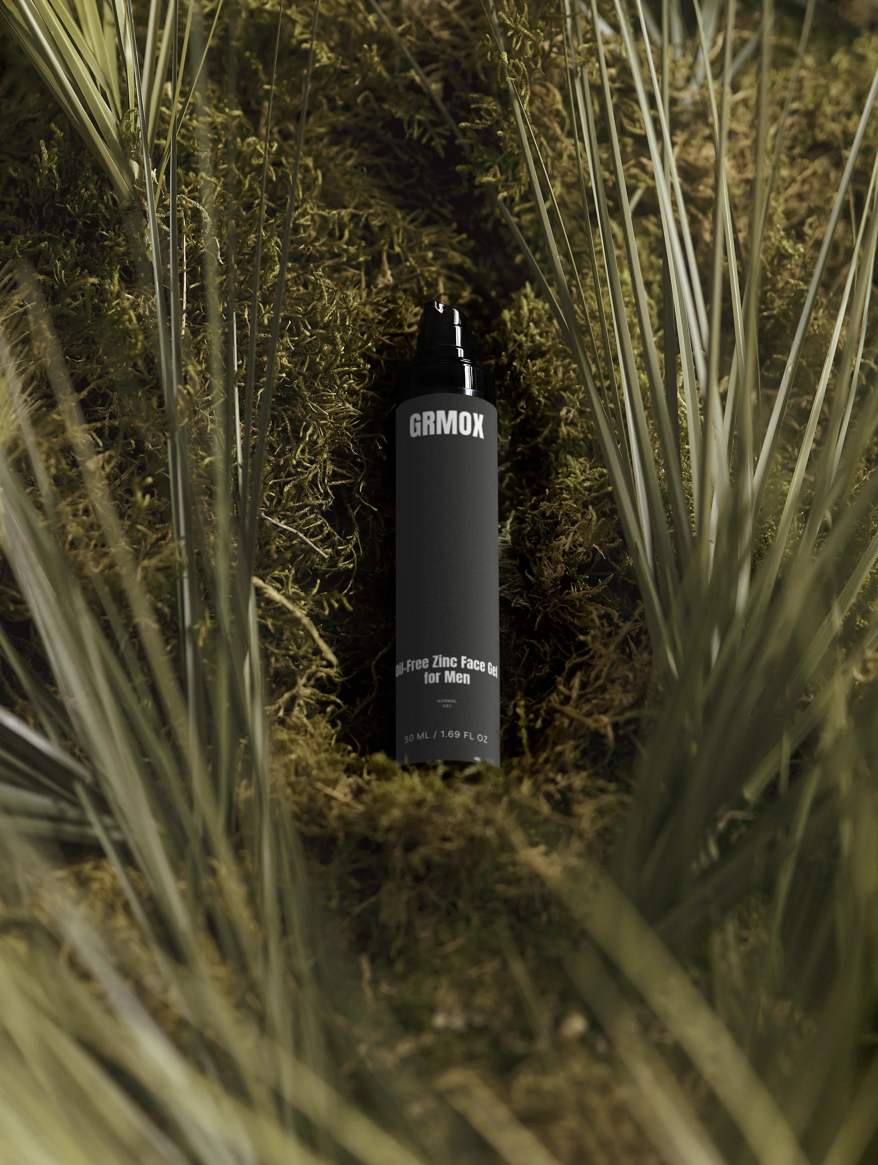 GRMOX Oil-Free Zinc Face Gel for Men nestled in moss and grass, 50ml skincare for normal to dry skin