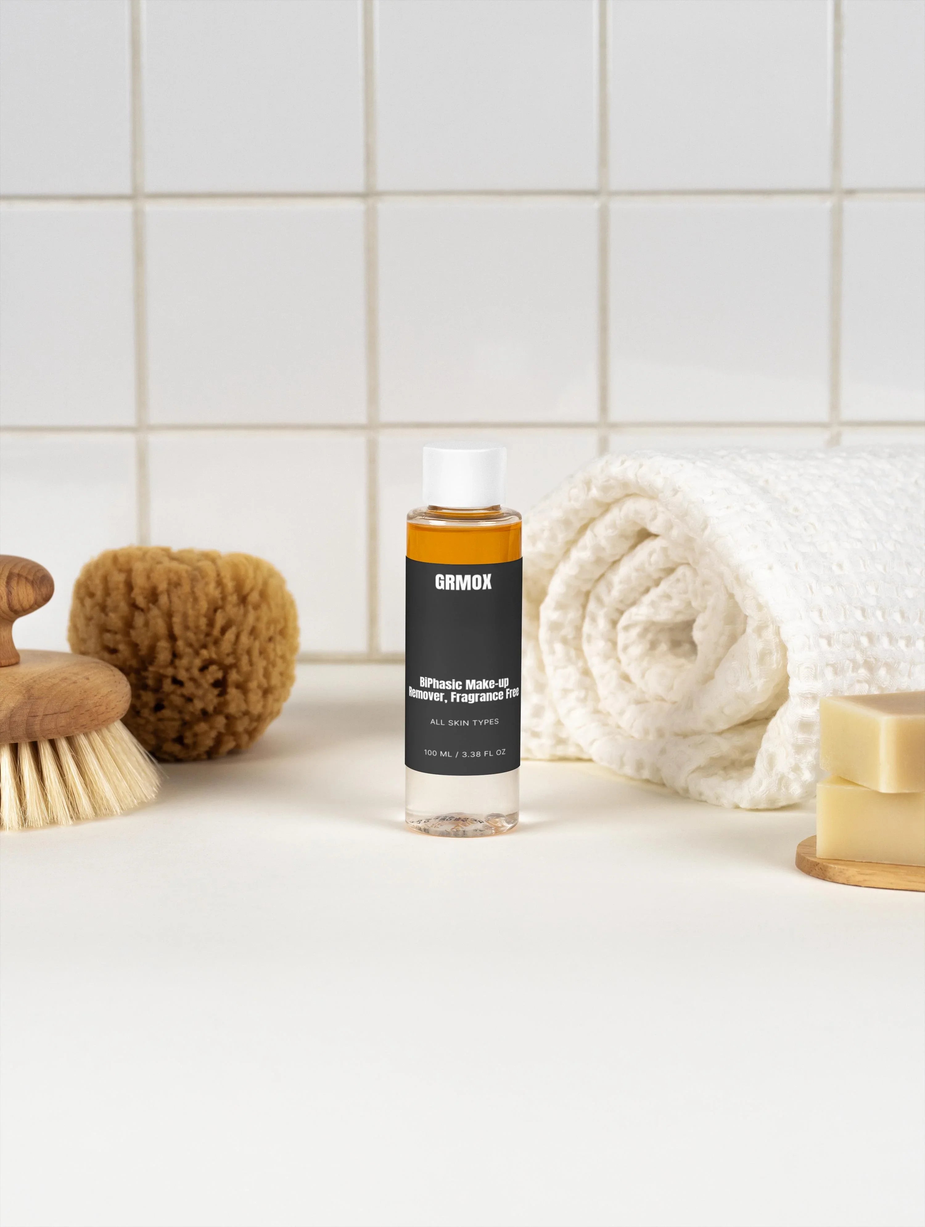 GRMOX biphasic makeup remover, fragrance-free for all skin types, with towel and bath accessories