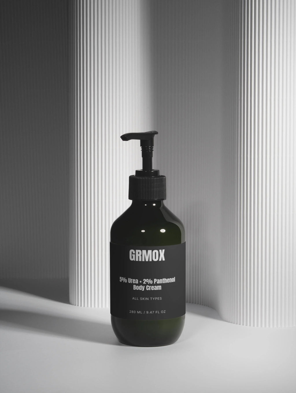 GRMOX body cream with 5% urea and 2% panthenol for all skin types, black pump bottle