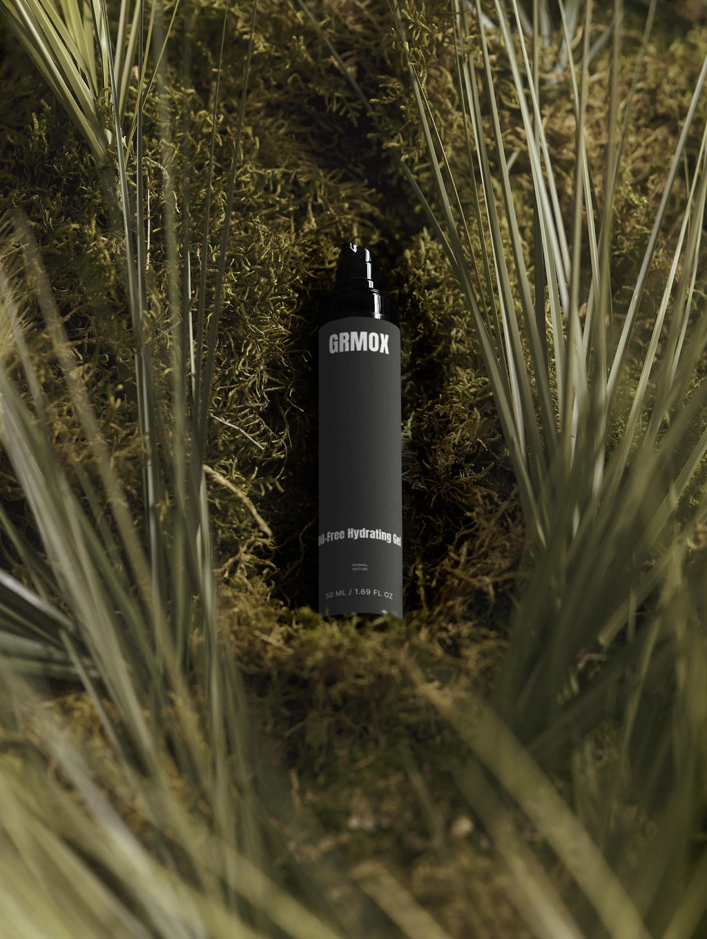 GRMOX Oil-Free Hydrating Gel 50ml nestled in moss and grass, natural skincare for normal to mature skin