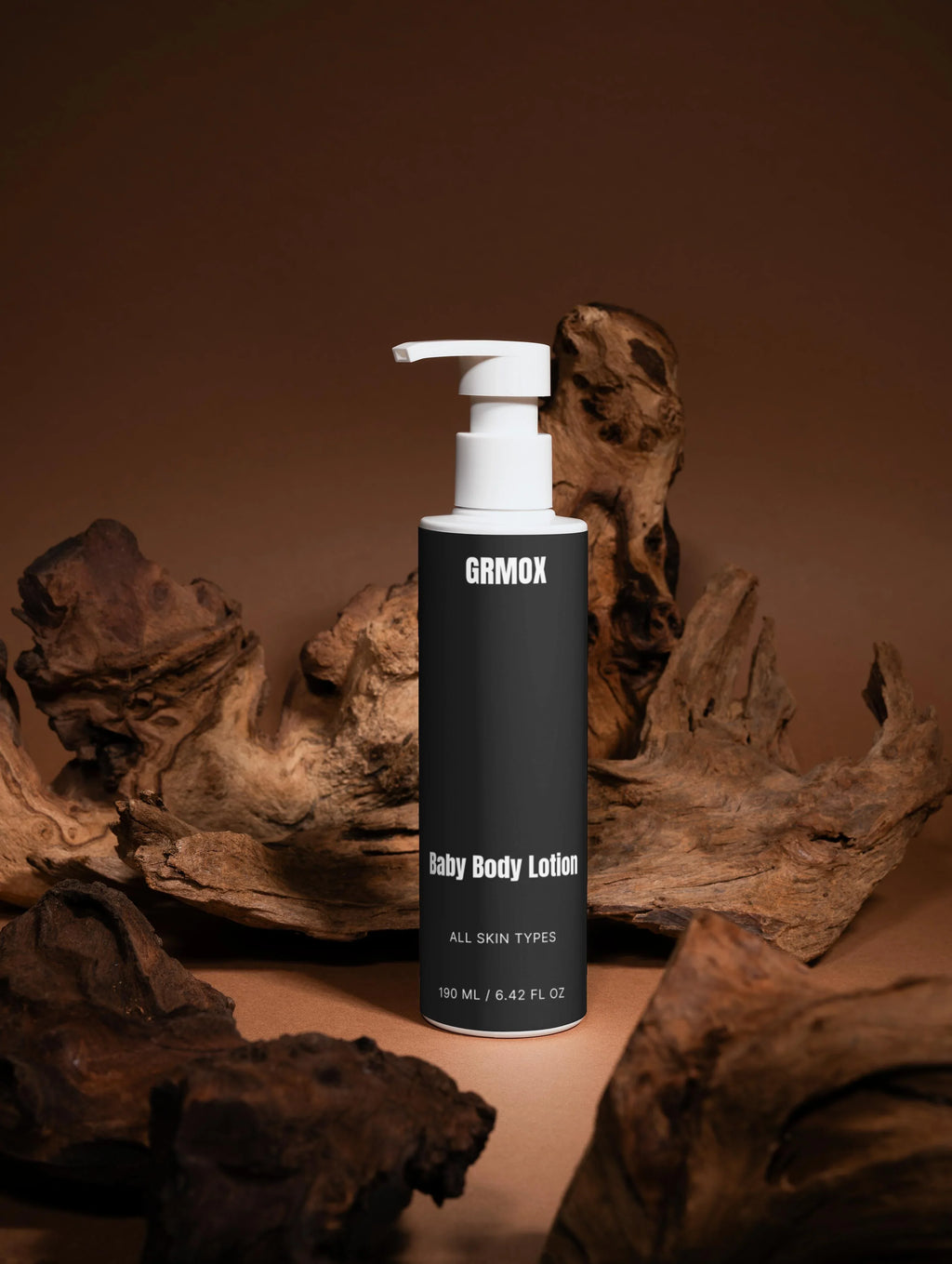 GRMOX Baby Body Lotion for all skin types, 190ml pump bottle with natural driftwood background