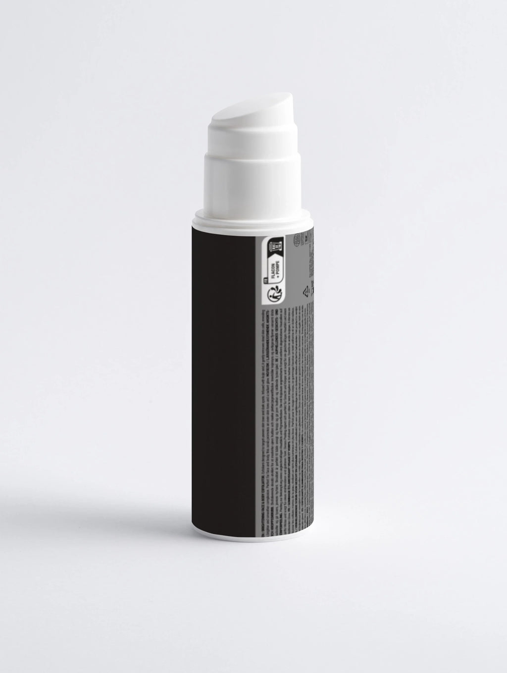 Black and white skincare bottle with pump dispenser, clean minimalist design for face and body care