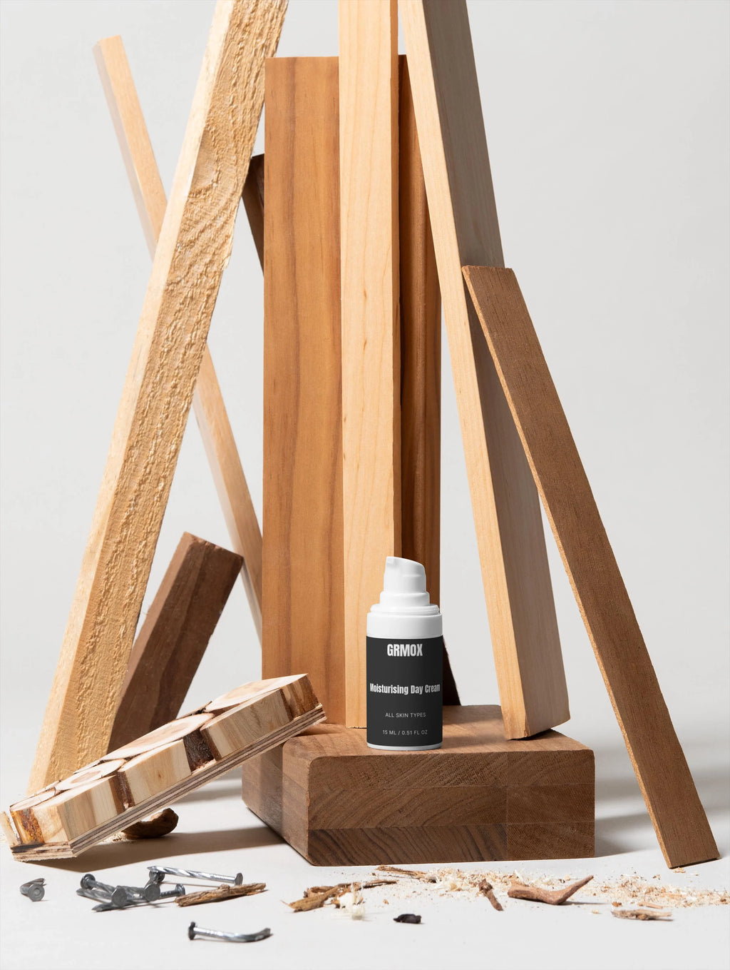 GRMOX Moisturising Day Cream for all skin types, displayed with natural wood planks and shavings.
