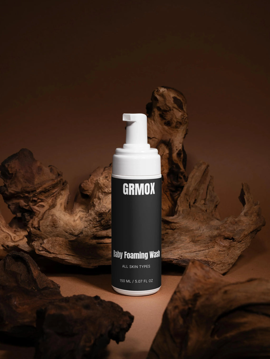 GRMOX Baby Foaming Wash for all skin types, 150ml, displayed with rustic driftwood background