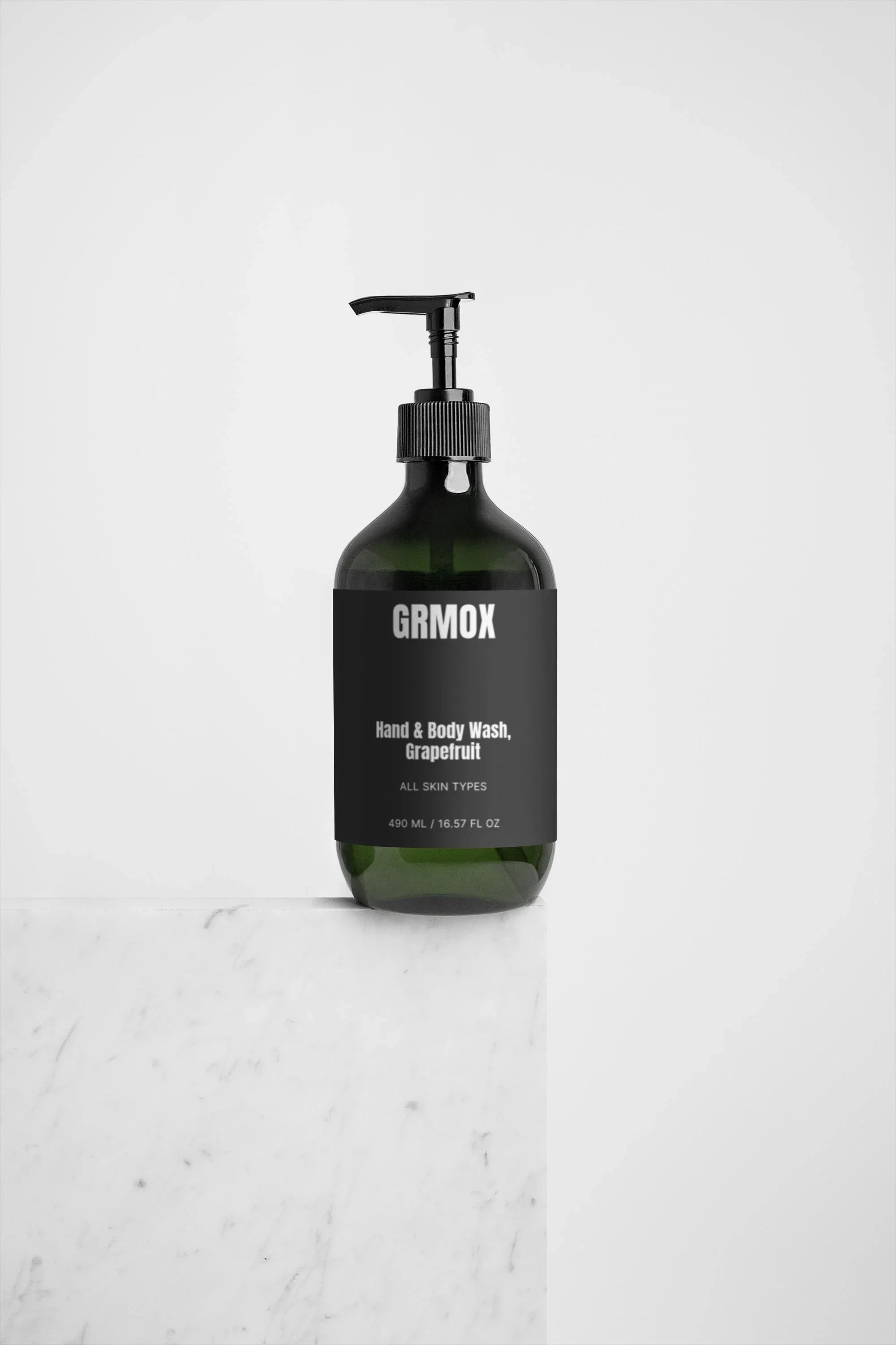 GRMOX grapefruit hand and body wash in dark green bottle with black pump, for all skin types