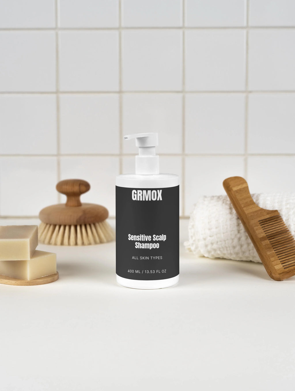 GRMOX Sensitive Scalp Shampoo for all skin types, 400ml bottle with pump, beside wooden brush and soap bars